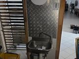 someone is taking a picture of a bathroom with a toilet and a sink