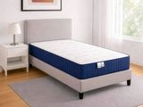 an image of a bed with a mattress on it in a room