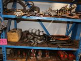 a shelf with various tools on it in a room