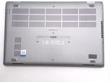 a laptop that is sitting on a white surface