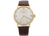 a close up of a watch on a white background with a brown strap