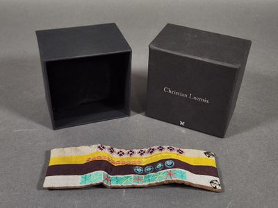 an image of a pair of glasses and a box on a table