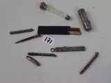 a lot of different types of knives on the table