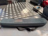 a case that is sitting on a table next to some tools