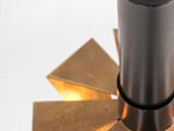 a close up of a light that is on a white surface