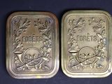 two silver bars with the words forgets and forgets on them