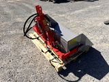 une petite machine posée sur une palette