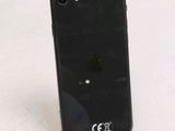a close up of a cell phone on a stand