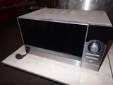 a microwave that is sitting on a counter top