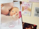 pictures of a baby and a baby doll on a table