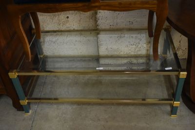 a glass shelf with a mirror on top of it