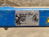 a close up of a sign on the side of a blue bike