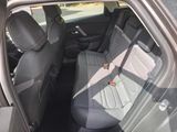 the back seats of a car with a seat belt in a car