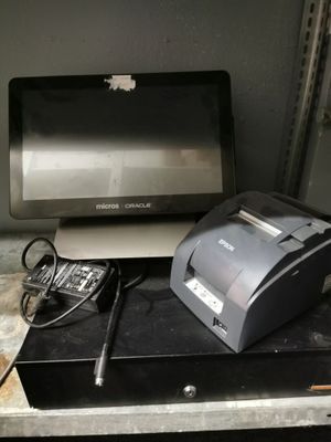 a computer and a printer on a desk