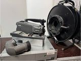 a camera and a microphone sitting on a table
