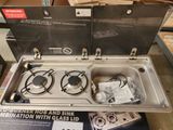 two burners on the top of the stove in the box
