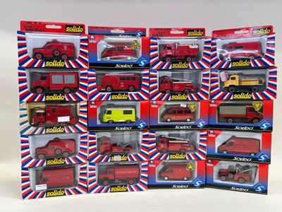 a lot of red and yellow toy cars in a display case