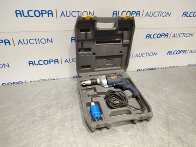 a tool kit in a plastic case sitting on a table