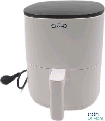 a white air fryer sitting on a white surface