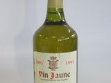 a bottle of wine that is sitting on a table