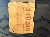 a piece of paper on the tire of a car