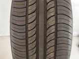 a close up of a tire on a white surface