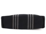 a close up of a black and grey striped belt on a white background