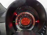 a close up of a car dashboard with a speedometer