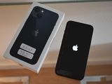 a box with an apple phone next to a box with an iphone on it