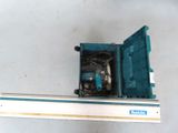 a blue and white box with a drill on top of it