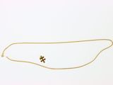 l'image d'un collier en or orné d'une croix