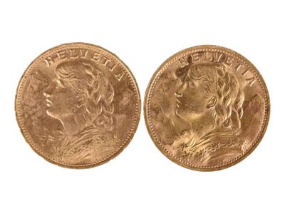 Deux pièces de vingt francs or suisse, 1935. Usures. - Photo 1