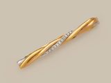 a gold and diamond bar brooch