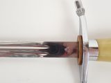 a knife that is laying on top of a knife holder