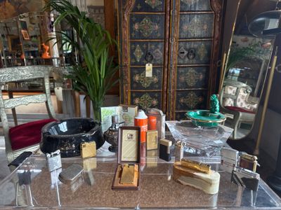a glass table with a lot of items on it