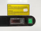 a close up of a cell phone with a sign on it
