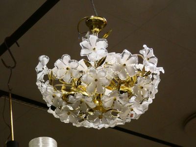 a chandelier that is hanging from the ceiling