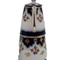 an image of a white and blue salt and pepper shaker