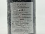 a bottle of wine that is wrapped in plastic