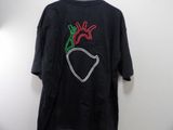 a black shirt with a red and green heart on it