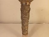 silver plated candle holder in the shape of a flower