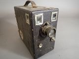an old camera that is sitting on a table