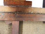 a piece of wood on the top of a wooden table
