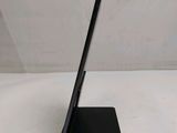 a black tablet computer sitting on top of a black stand