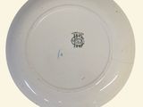 a white plate with a black and white design on it