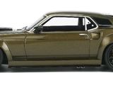 an image of a model of a gold muscle car