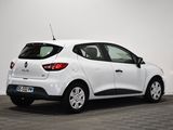 the rear end of a white car parked in a room
