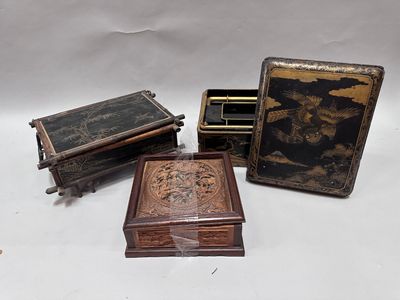 three small wooden boxes are sitting next to each other on a white surface