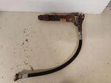 a hose attached to the side of a refrigerator