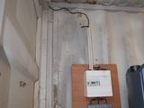 a tank that is sitting in the corner of a room